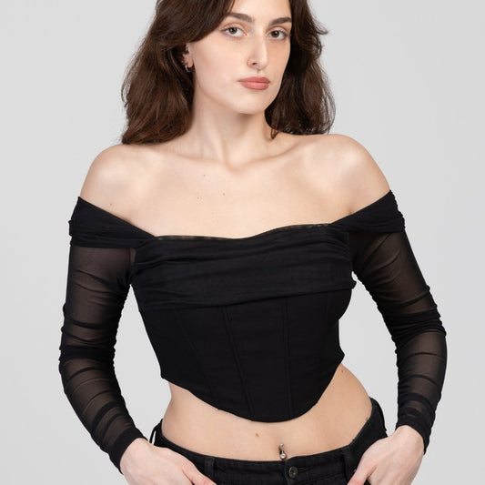model in black corset top with sleeves, fort face photo